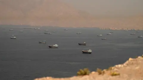 US demands Iran pledge to stop attacks on ships in Strait of Hormuz amid fresh ceasefire tensions