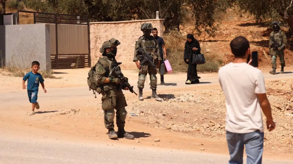 West Bank Tensions Escalate: Israeli Military Forces Palestinians from Homes in Qusra Village