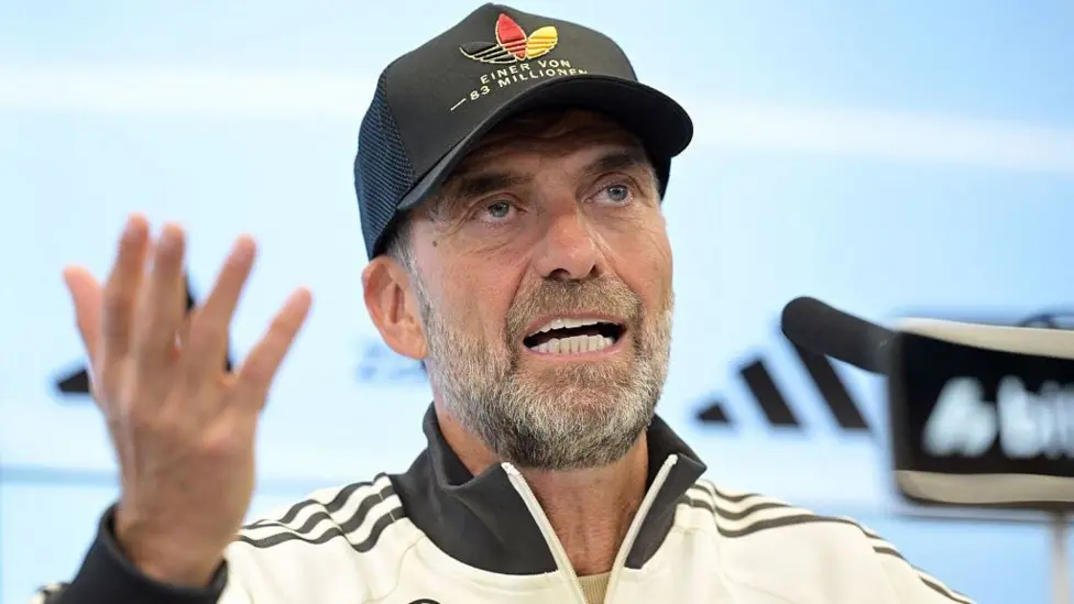 Jurgen Klopp takes Germany helm, vows to reclaim national pride from far-right politics
