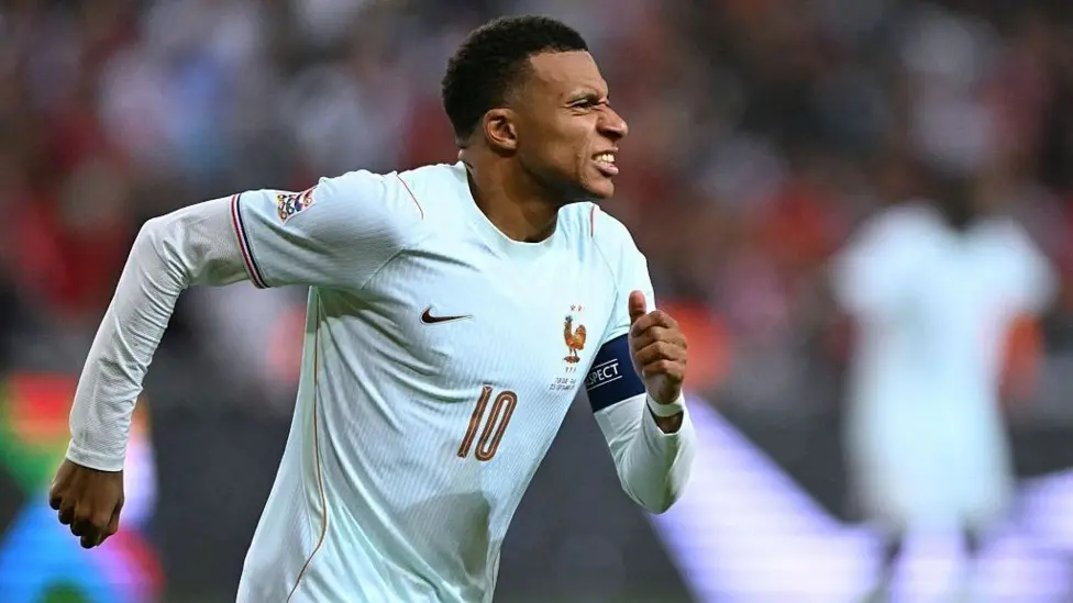 Mbappe sidelined after knee injury in Zidane's France debut