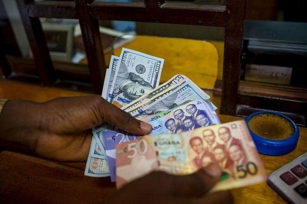 Cedi tumbles to 11.95 per dollar as import demand drains forex reserves